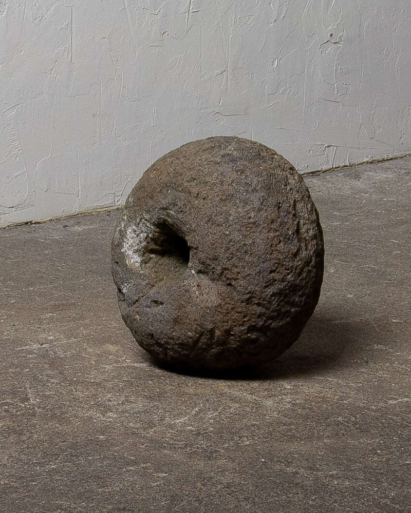 
                  
                    Old Round Stone Sculpture
                  
                