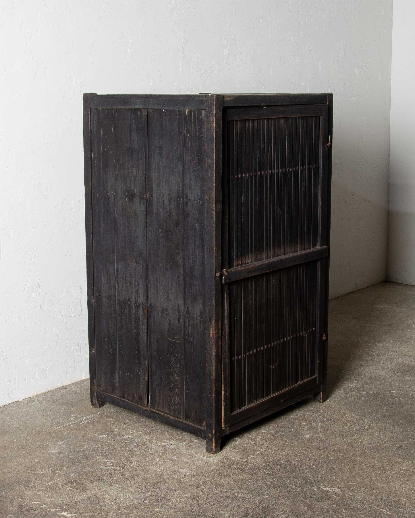 
                  
                    Old Black Storage Cabinet
                  
                