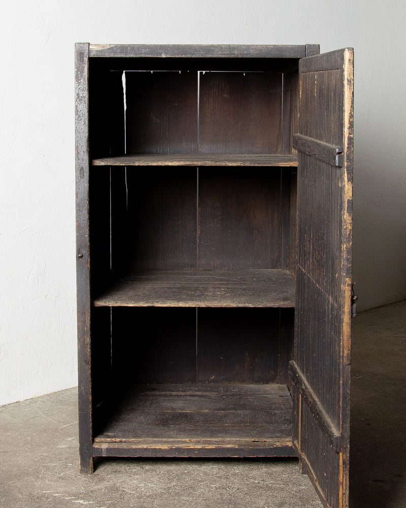 
                  
                    Old Black Storage Cabinet
                  
                
