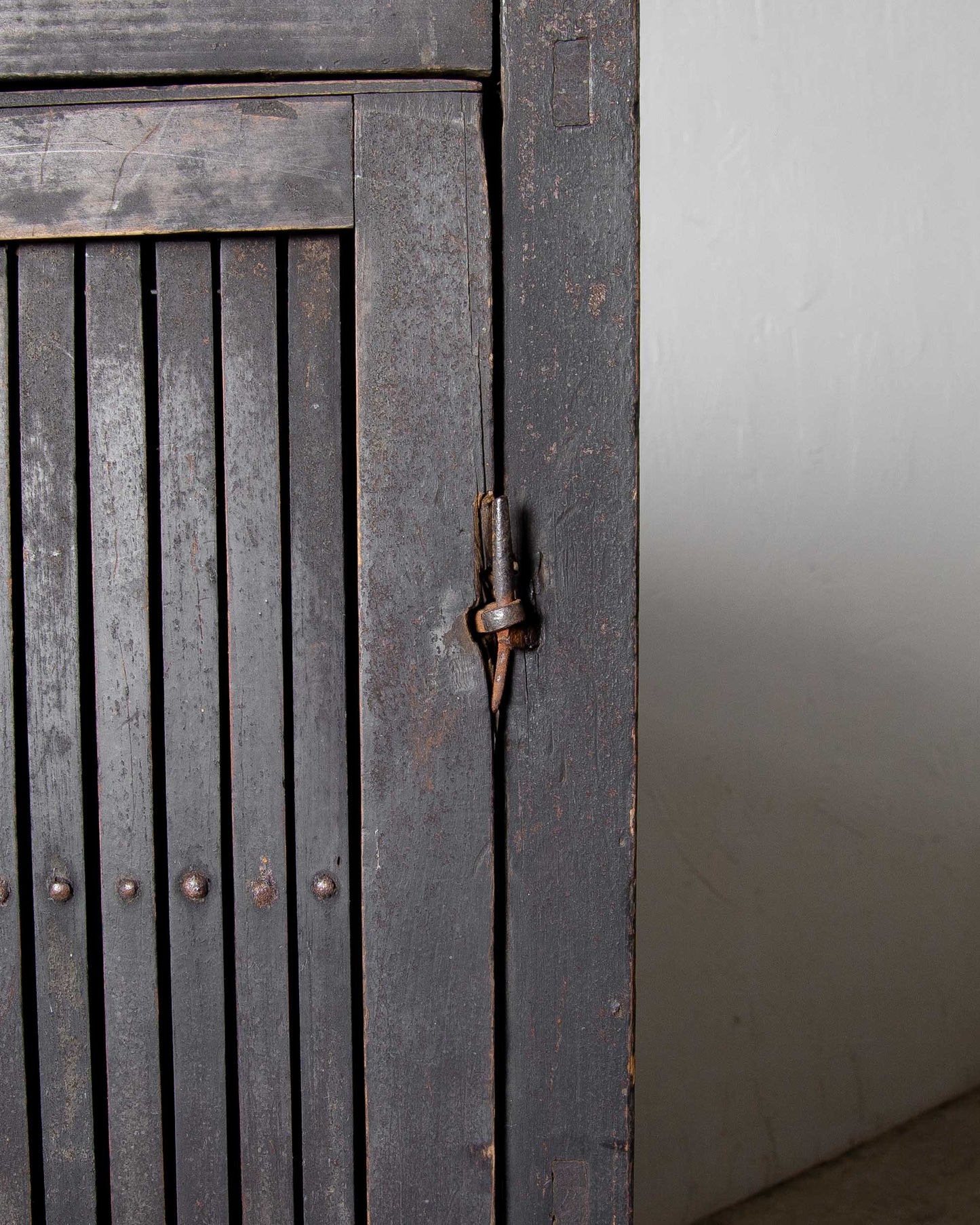 
                  
                    Old Black Storage Cabinet
                  
                
